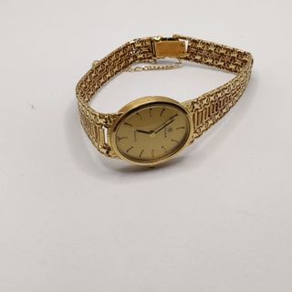 Reloj CYMA Dama de oro de 18k de Pila, 26.6 g.