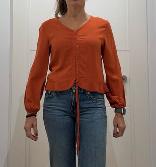 Blusa naranja con cordón