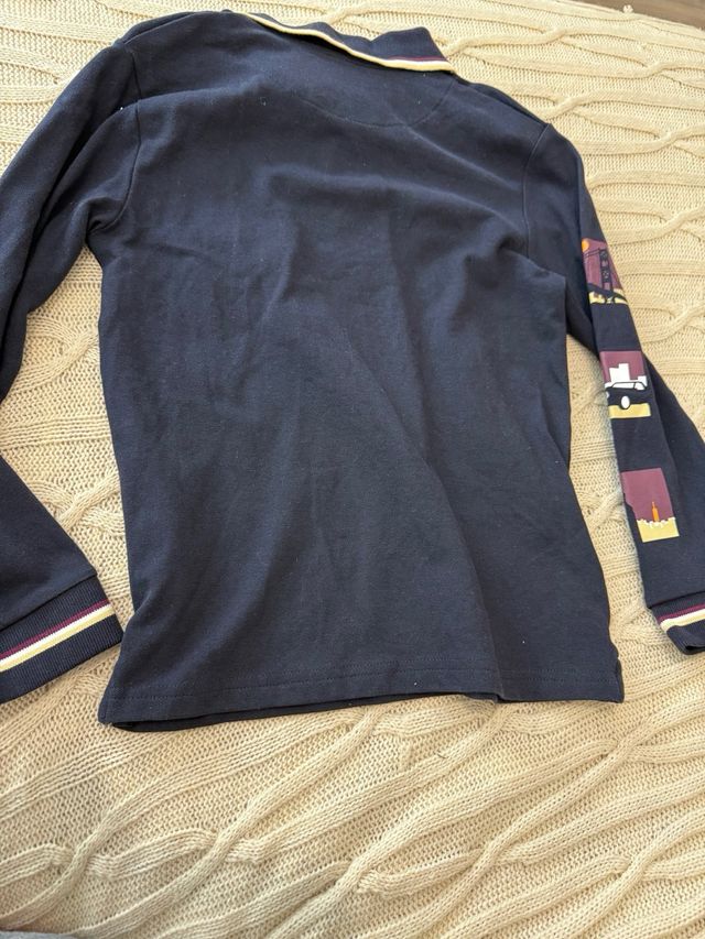 Polo Mayoral manga larga azul talla 8 años