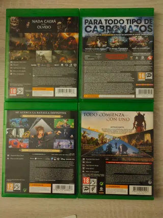 Scatoletta di quattro videogiochi per Xbox One: Shadow of War, Kingdom Hearts, Assassin's Creed e Battleborn