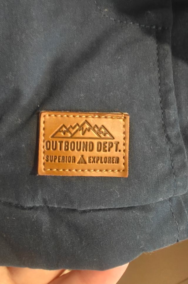 Parka blu con cappuccio e pelo