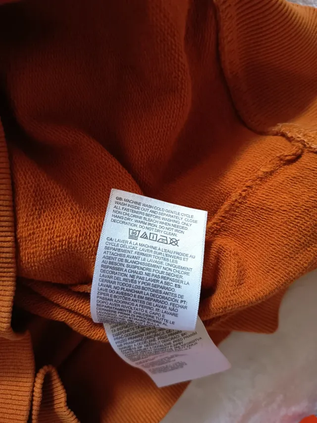 Felpa The North Face arancione con cappuccio