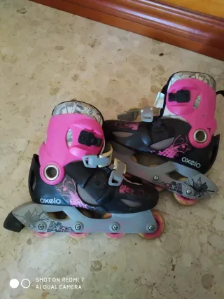 Patines Oxelo rosas y negros talla ajustable