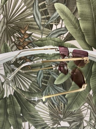 Occhiali da sole oro e viola