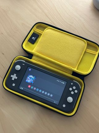 Nintendo Switch Lite Nera + Custodia