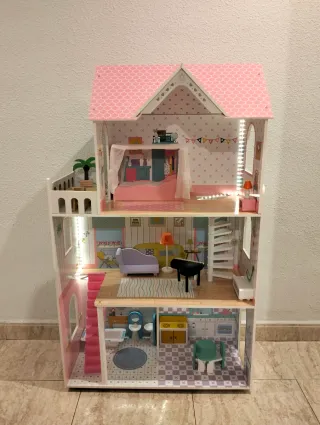 Casa de muñecas rosa de 3 plantas
