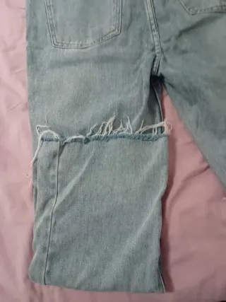 Jeans vita alta strappati