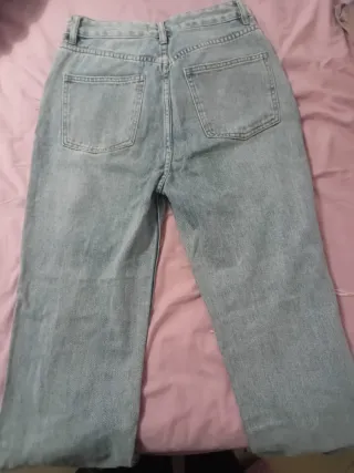 Jeans vita alta strappati