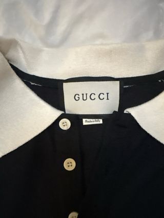 Polo Gucci nero con banda laterale