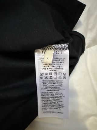 Polo Gucci nero con banda laterale