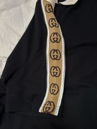 Polo Gucci nero con banda laterale