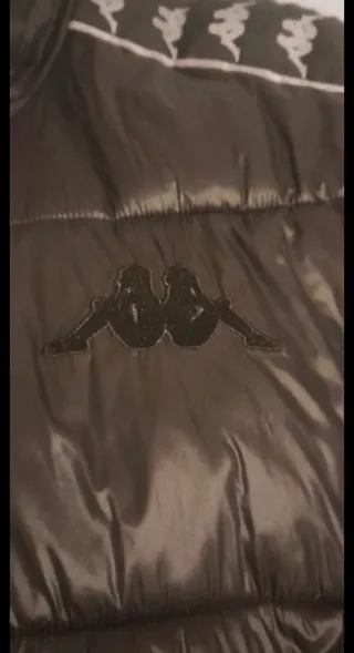 Piumino Kappa nero con banda logo