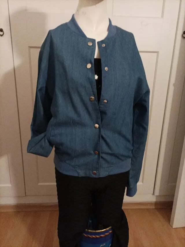 Malla elástica L/XL y Top elástico  . Cazadora