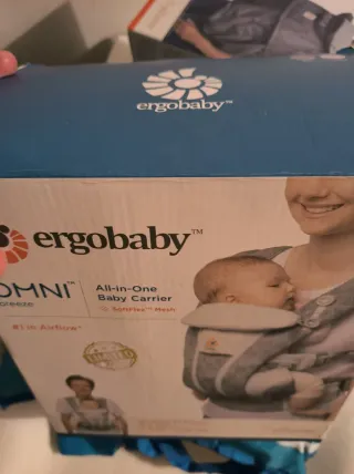 Mochila Ergobaby Omni Breeze + Funda Impermeable