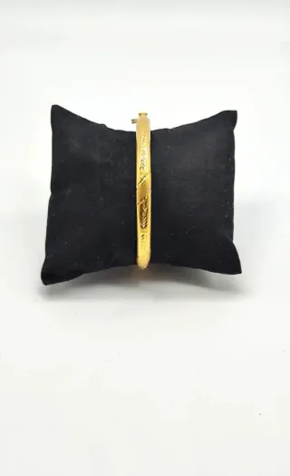 Pulsera oro 18k media caña tallada