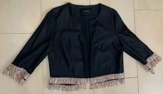 Chaqueta Niu Collection con flecos dorados