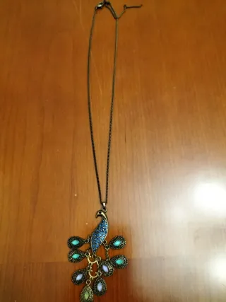 Colgante pavo real antiguo