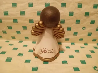 Angelo della felicità con arcobaleno e scritta