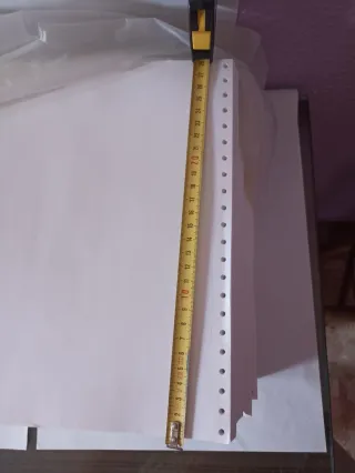 Paquete de papel continuo en color blanco.