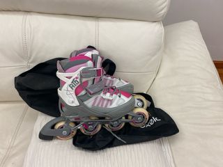 Patines niña Oxelo con funda blancos rosa y gris