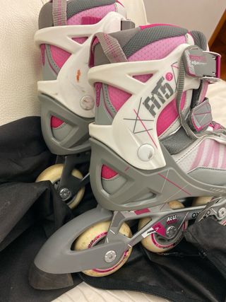 Patines niña Oxelo con funda blancos rosa y gris