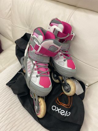 Patines niña Oxelo con funda blancos rosa y gris