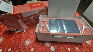 Nintendo Switch Lite Rosa + 4 Giochi