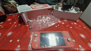Nintendo Switch Lite Rosa + 4 Giochi