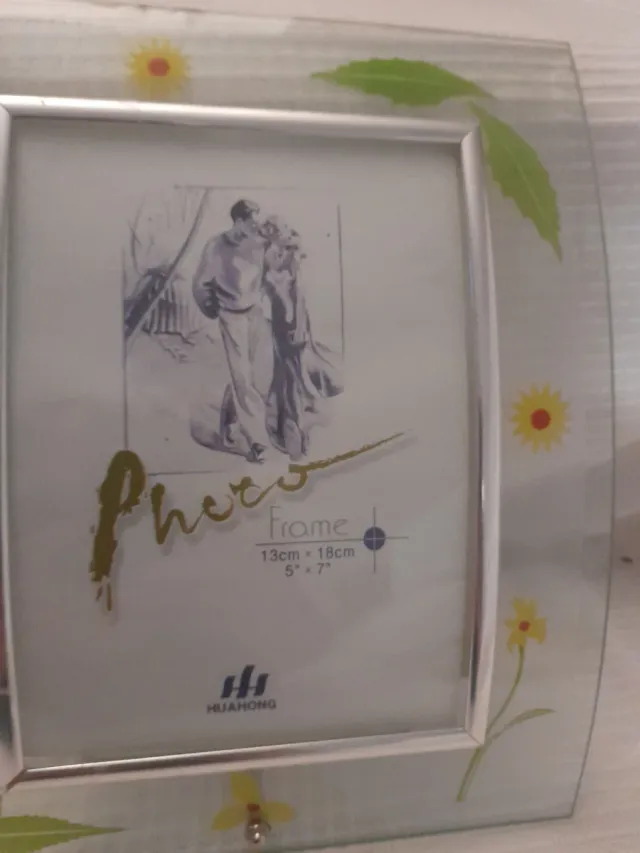 Marco de fotos cristal y metal.