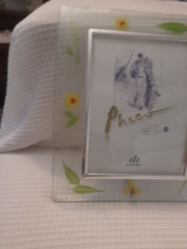 Marco de fotos cristal y metal.