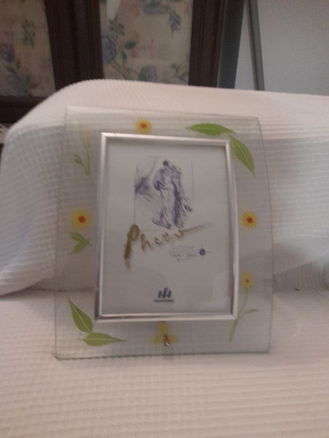 Marco de fotos cristal y metal.