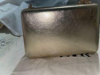 Bolso fiesta Parfois doble cadena dorado