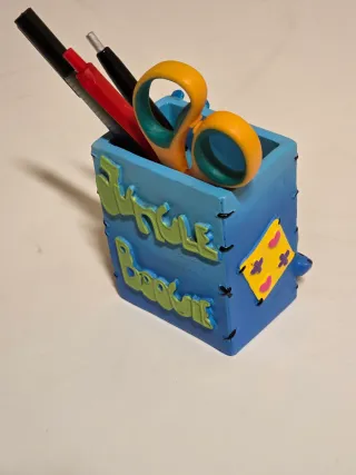 Porta canetas azul com elefante