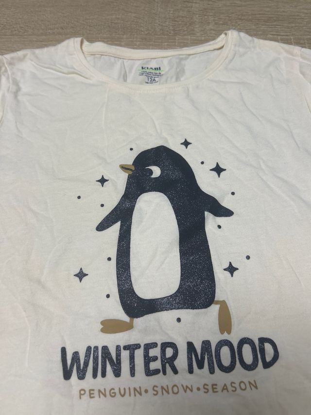 Camiseta Kiabi pingüino invierno talla 12A