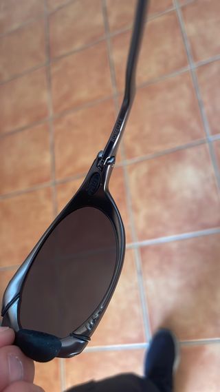 Occhiali Oakley X Metal Nero/Marrone