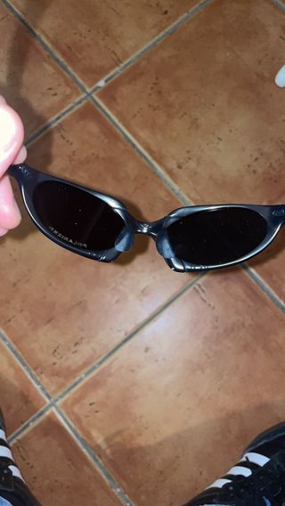 Occhiali Oakley X Metal Nero/Marrone