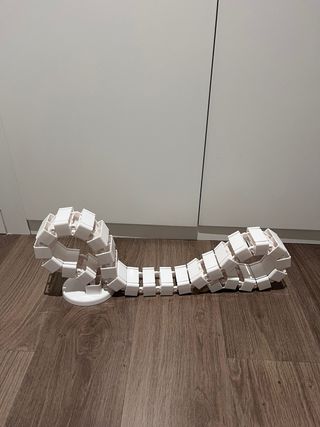 Columna organizadora de cables blanca