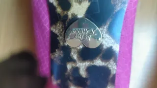 Botines rosas con estampado de serpiente