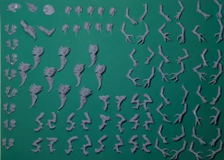 10 genestealers de resina para montar Sin peana