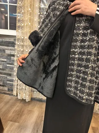 Capa de mujer con pelo