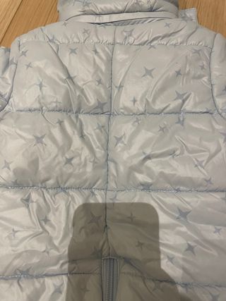 Buzo de invierno azul con estrellas