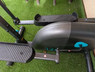 Elíptica negra y turquesa