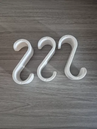 Ganci per termosifoni bianchi