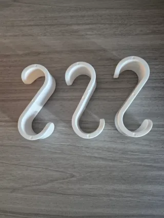 Ganci per termosifoni bianchi