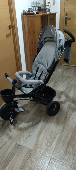 Triciclo infantil gris....  No hago envio