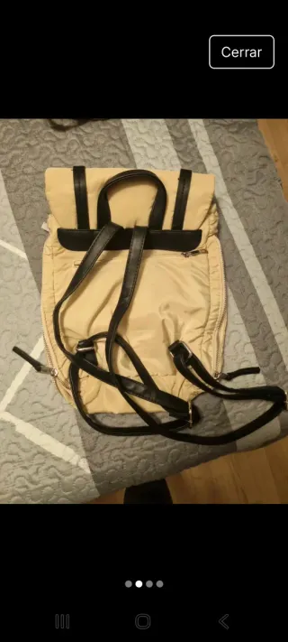 Bolso rosa con hebillas y mochila