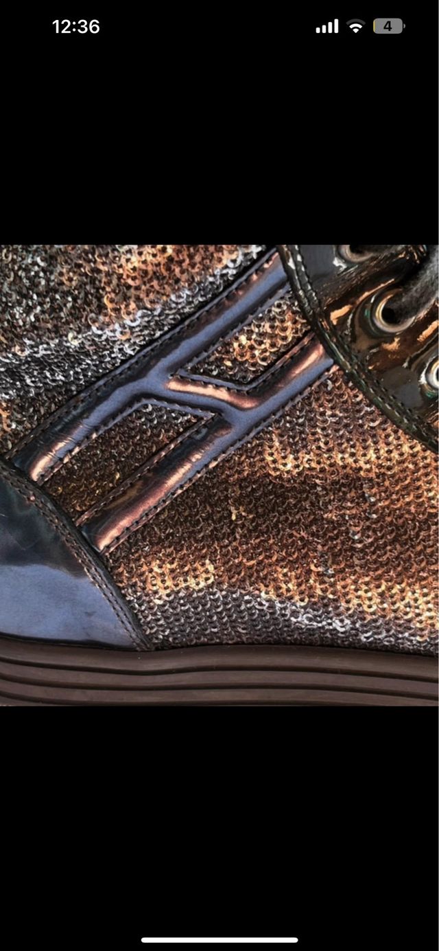 Sneakers Hogan alte da donna in pelle nere e argentate