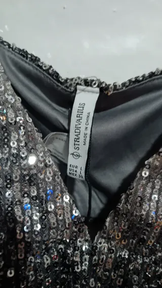 Top Stradivarius lentejuelas gris/plata XS