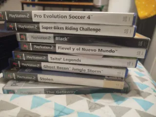 Lote PS2 con mando, tarjeta, cables y juegos