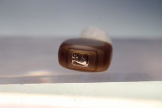 Mini perfume Youth-Dew de Estee Lauder.